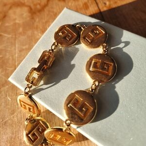 GIVENCHY Vintage Gold Logo Coin Medallion Bracelet